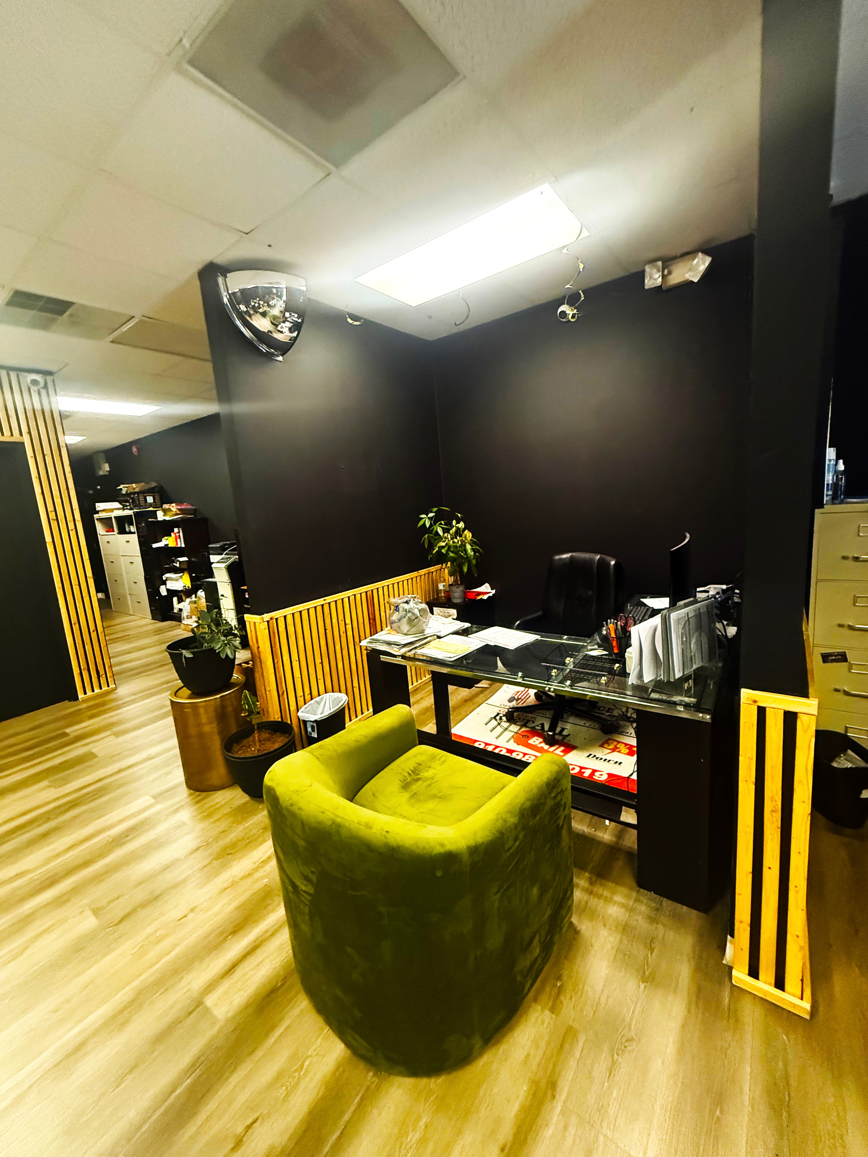 Golder Bail Bonds office with green chairs